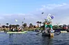 Decorated boats and flags on the Nile near Qurseya Island during VeryNile’s parade in Giza, Egypt.