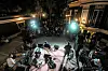 Band performs on an outdoor stage before a crowd at night in Cairo.