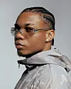 A studio portrait of KiDi.