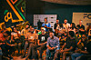 An image of young people sitting together.