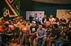 An image of young people sitting together.