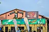 The New Afrika Shrine in Lagos, with Fela Kuti’s portrait above the entrance and banners advertising Felabration 2016.
