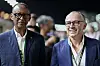 Paul Kagame and Stefano Domenicali pose together at the Singapore Formula One Grand Prix.