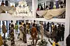 Guests look at models wearing creations by Designer Michelle Adepoju, founder of Kilentar, standing on a podium during a private installation to launch the SS26 collection in Temple Muse store during Lagos Fashion Week in Lagos, on November 1, 2025.