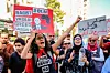 Tunisians, carrying banners and flags, gather in front of the Assembly of People's Representatives to protest against a proposed amendment to the electoral law presented by some members of parliament in Tunis, Tunisia on September 27, 2024. Demonstrators are also demanding that elections be transparent and fair.