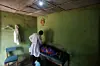 A photo of a doctor examining a pregnant woman in a clinic powered by solar energy at Sabon-Gida village , near Lafia, Nasarawa State, Nigeria on October 17, 2023.