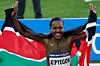 Kenya's Faith Kipyegon reacts after winning and beating the world record in the women's 1500m during the 'Meeting de Paris' Diamond League athletics meeting at the Charlety Stadium in Paris on July 7, 2024.