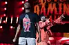 J hus performs onstage with burna boy