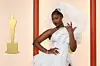 ​Tems wearing white at the 2023 Oscars