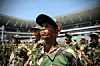 A photo of a former uMkhonto weSizwe member wearing full military camouflage during a parade marking the 50th anniversary of the group’s establishment.