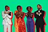A photo of Chadwick Boseman, Danai Gurira, Lupita Nyong'o and Michael B. Jordan doing the 'Wakanda Forever' sign - arms crossed in front of the chest.
