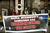 Protesters in London’s Regent Street hold a banner saying “Apple, Microsoft, Samsung Killing in Congo for Coltan” outside the Apple Store during the demonstration on April 6, 2024.