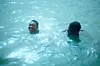 A still from Ramata-Toulaye Sy\u2019s \u2018Banel & Adama\u2019 showing the lead characters swimming.