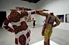 A photo of Yinka Shonibare MBE\u2019s installation \u201cHow to blow up two heads at once\u201d at the 2007 Venice Biennale.