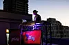 P Kuttah on the decks to a backdrop of a portion of the Joburg skyline.