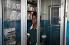 MARYLAND, LIBERIA - 2018/06/01: A medical worker seen standing in the pharmacy section of Pleebo Health Center, Maryland, southeast Liberia. Liberia is listed as one of the high-burden countries for tuberculosis by the World Health Organization. In September, the United Nations will hold the first-ever meeting on ending TB.