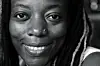 A monochrome portrait of Tsitsi Dangarembga.