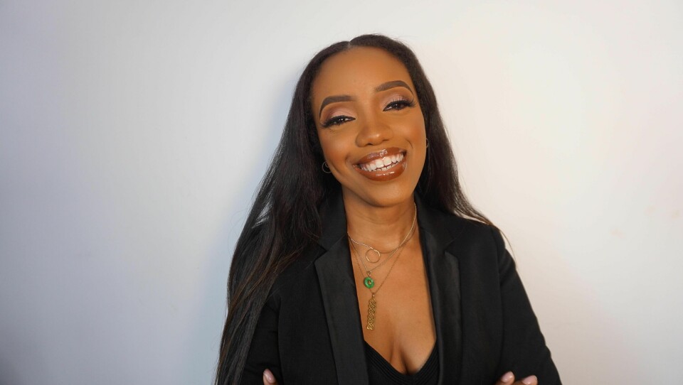 Relocating to Ghana Helped Reinvigorate Jewelry Designer Aisha Asamany's Work A woman wearing jewelry around her neck smiles