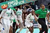 Team Nigeria celebrates after winning Australia at the preliminary round basketball game at the Paris Olympics.