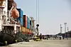 People load up a cargo ship in the Port of Berbera in Somaliland on December 5, 2015. The main exports from Somaliland are livestocks to the Gulf countries like Saudi Arabia, Dubai and Qatar.