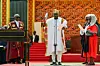 Ghana's new President John Mahama (C) holds a Bible as he takes the oath of office at his inauguration at the Independence Square in Accra on Jan. 7, 2025.