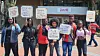 Afro-Colombian, Black, Raizal, and Palenquero civil-rights activists holding signs protesting the Colombian census' erasure of Afro-descendants.