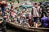 Congolese displaced fleeing the area of Minova board with their belongings boat leaving the port of Nzulo on January 21, 2025 to seek shelter in Goma.