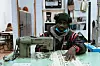 A seamstress working in Spain.