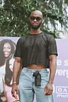 Nigerian man wearing mesh shirt during Lagos Fashion Week 2019