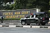 Officers of the Nigeria Police Force are seen outside the Federal High Court in Abuja, Nigeria, on October 21, 2021.