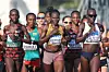Rebecca Cheptegei of Team Uganda (center) crosses the Szechenyi Chain Bridge in the Women's Marathon during day eight of the World Athletics Championships Budapest 2023 on August 26, 2023 in Budapest, Hungary.