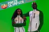 A photo of two models wearing the Nigerian 2024 Olympics white tracksuit with green sleeves, designed by Actively Black.