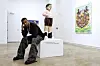 Vic Mensa in front of art
