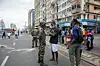 A Mozambique soldier speaks with a protester after protesters clashed with police officers in Eduardo Mondlane Avenue in Maputo November 7, 2024.