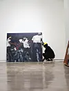 Vic Mensa holding painting
