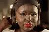 A still from Nyadollie’s makeup tutorial video on YouTube.