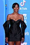 Tiwa Savage black dress