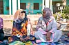 Salma Salah (right) meets with women across Sudan to help them educate and connect women to care.