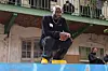 American designer Virgil Abloh wearing yellow sneakers
