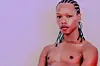 South African artist Nakhane poses shirtless, stares at the camera.
