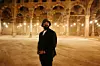 A photo of PJ Morton in an old Egyptian building.