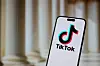The TikTok app and logo are seen on a mobile device in this illustration photo taken in Warsaw, Poland on 14 January, 2025.