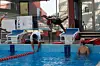 Rana Saadeldin diving into the pool during swim practice.