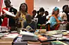 People attend the Abidjan International Book fair in Abidjan on May 13, 2023.