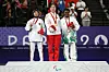 (L-R) Silver medalist, Qonitah Ikhtiar of Team Indonesia, gold medalist, Zuxian Xiao of Team People\u2019s Republic of China, and bronze medalist, Mariam Eniola Bolaji of Team Nigeria, pose for a photo during the Women's Singles SL3 medal ceremony on day five of the Paris 2024 Summer Paralympic Games at Porte de La Chapelle Arena on September 02, 2024 in Paris, France.