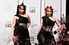 Tarryn Reid and Clairise Hefke wear identical black dresses with distressed fabrics on the 2025 BET red carpet.