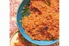 An image of jollof rice from the \u201cGhana to The World\u201d cookbook