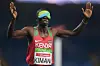 Samwel Mushai Kimani of Kenya celebrates winning the gold medal in the Men's 1500m - T11 Final on day 6 of the Rio 2016 Paralympic Games at the Olmpic Stadium on September 13, 2016 in Rio de Janeiro, Brazil.