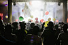 Fans in front of a stage with balloons floating at Cotton Fest 2020.