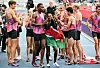 Kenya's Faith Kipyegon (C) reacts at the end of her race after taking part in the 'Breaking4' event, in an attempt to become the first woman to run a mile in under four minutes, at Stade Charlety on June 26, 2025 in Paris.